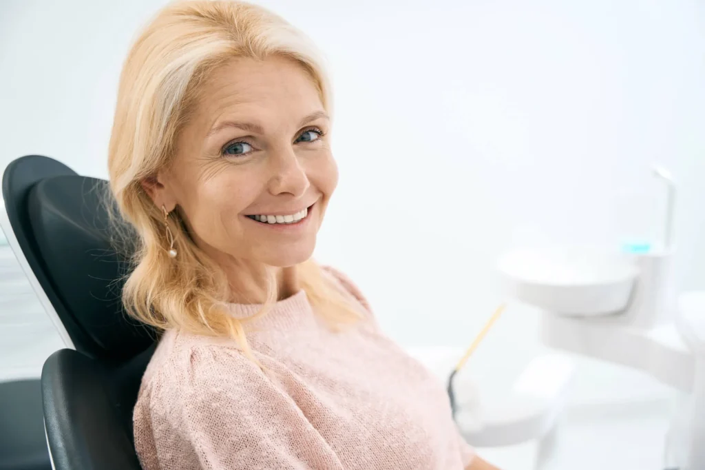 senior lady wearing dental crowns athens