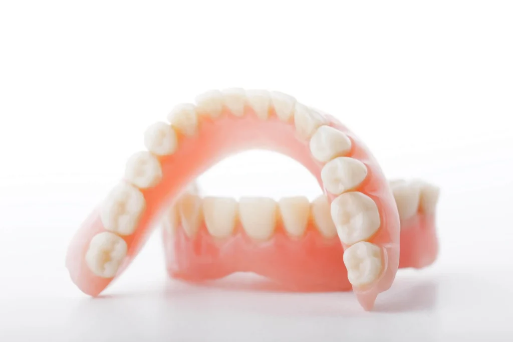 dentures athens ga on white background